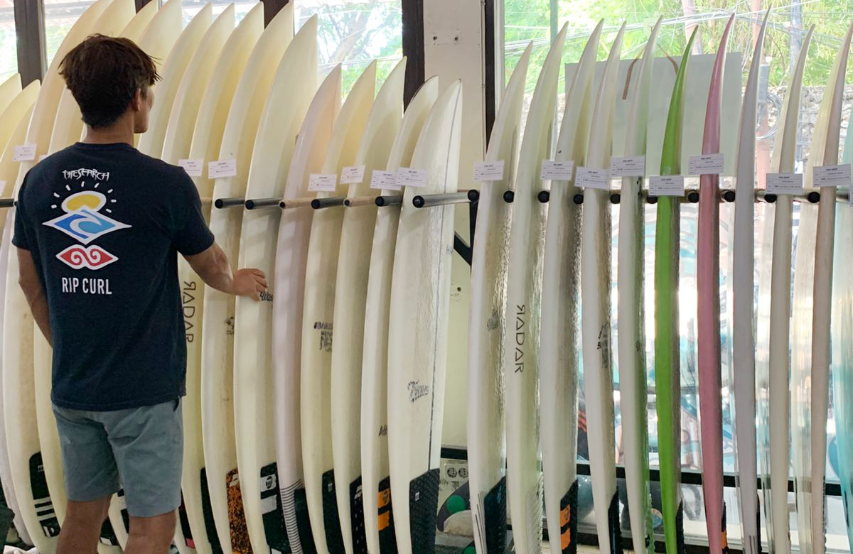 Customer with surfboard